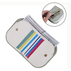 Detail view of foldable bi-color wallet showing multi-card slots and coin zipper pocket