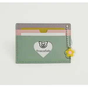 Macro detail of litchi texture card holder with colorful slots and heart cutout