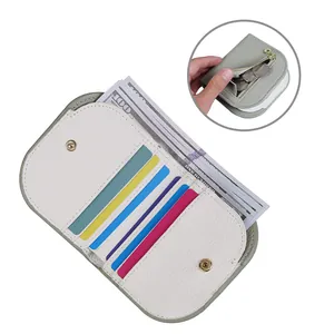 Slim tri-fold wallet with multi-color card slots, coin pocket and snap button closure
