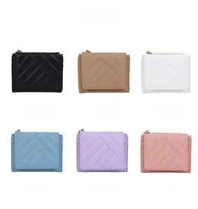Quilted mini wallets in six colors with V-pattern stitching and gold zipper detail