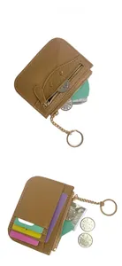 Detailed view of brown leather wallet featuring multiple card slots and gold zipper