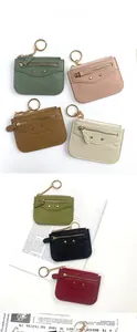 Litchi pattern leather coin purses in various colors with golden keychains and rivets