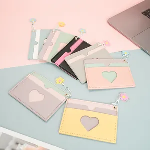 Slim multi-slot faux leather card holder with heart window and flower charm decor