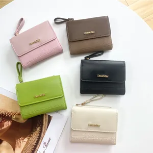 Short minimalist women's leather wallets in five colors with grid texture and hand strap