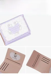 Detail of trifold light purple wallet showing heart-shaped ID slot and card holders