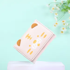 Pink cartoon tiger PU leather tri-fold wallet for women on decorative background