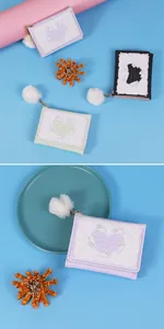 Three-fold cute rabbit wallets in purple, green and black with white pompom charms