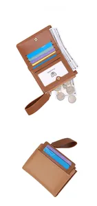 Brown leather compact wallet showing internal card slots, coin pocket and wristlet