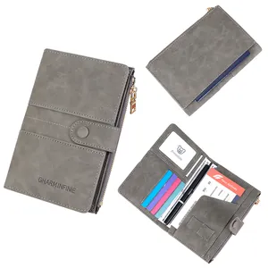 Gray RFID blocking passport holder wallet with multiple slots and gold zipper detail