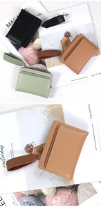 Detail of multi-slot card holders in PU leather with zipper and wrist strap
