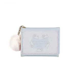 Detail of light blue tri-fold wallet with cute rabbit print and pink fluffy pompom charm