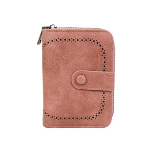 Portafoglio vintage in pelle PU rosa loto con fori tagliati al laser e chiusura a scatto