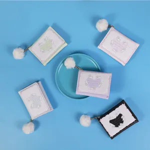 Cute tri-fold mini wallets with cartoon rabbit prints and plush pompom pendants