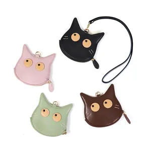 Dettaglio dei mini portamonete a forma di gatto in pelle PU in quattro colori assortiti