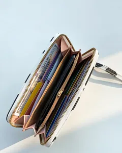 Detail view of large capacity wallet interior showing card slots and phone compartment