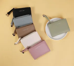 Litchi pattern leather zip wallets in six colors with wrist straps and metal hooks