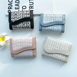 Portafogli da donna in tweed in nero, blu, rosa e beige con patta a onde eleganti