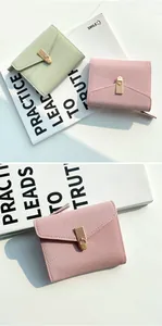 Close-up of minimalist bifold wallet with lychee leather texture and gold buckle