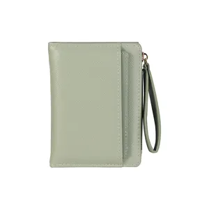 Sage green Saffiano leather minimalist card wallet with zipper and wrist strap