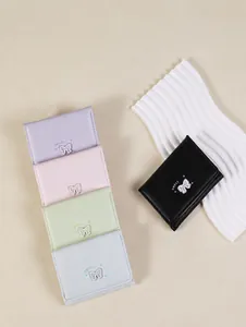Portefeuilles courts en cuir avec nœud doux en noir, rose, violet et vert menthe