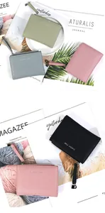 Detailed macro view of litchi texture PU leather card holder wallets in various colors