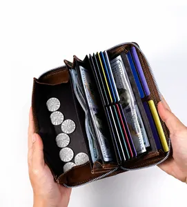 Detail view of large capacity long wallet with accordion compartments for cards and cash
