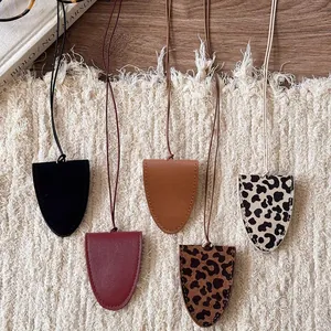 Five assorted leather sunglasses pouch necklaces in leopard print and solid colors
