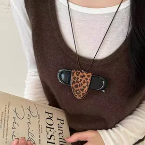 Leopard print magnetic sunglasses holder necklace with brown leather textures for women