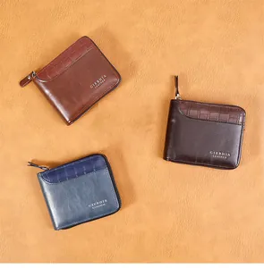 Detailed view of short zipper wallets with stone pattern and leather stitching texture