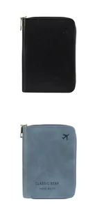 Macro view of RFID-blocking travel wallets in black and blue-grey with zip closure