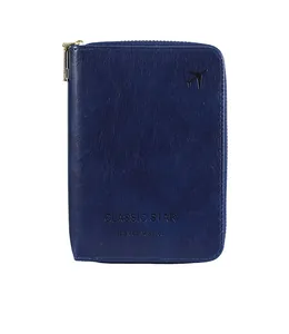 Detail of navy blue RFID travel wallet featuring classic star text and golden zipper closure