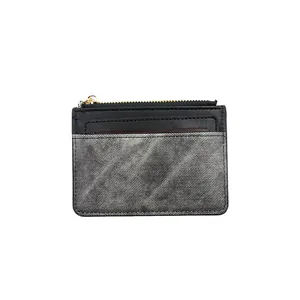 Slim leather mini card holder with black and silver textured design and gold zipper