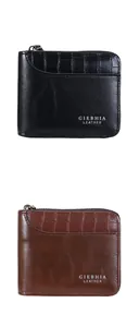 Vertical view of black and brown vintage wallets with zipper and stone leather pattern