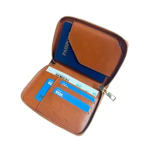 Brown leather RFID travel wallet with passport holder and credit card slots for travel