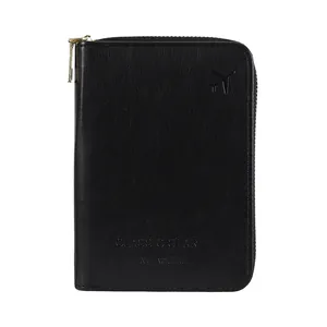 Classic black leather RFID travel wallet with gold zipper and embossed airplane icon