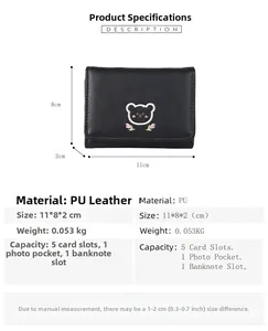 Detail view of bear embroidery on a compact PU leather trifold wallet with size specs
