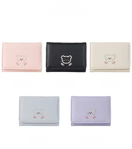 Five assorted colors of short PU leather wallets featuring cute bear and flower embroidery