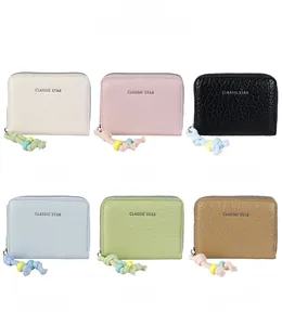 Litchi texture mini wallets in six colors with colorful beaded zipper pullers detail