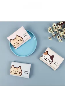 Detailed view of cute kitty tri-fold PU leather wallets in pink, cream, and light blue