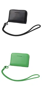Detail of macaron color zip purses with wrist straps and Forever Sunshine text in black and green