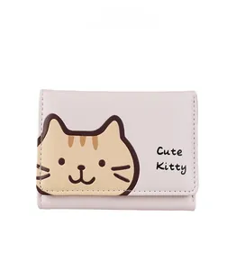 Detail of the cute kitty print and high-quality stitching on this pink trifold wallet