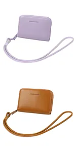 Detail of macaron wallets with lanyards in purple and brown colors with leather texture