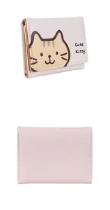 Detailed macro view of the cute kitty cat pattern on this tri-fold PU leather wallet