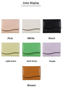 Short leather wallets for women featuring a wavy gold metal trim in seven colors