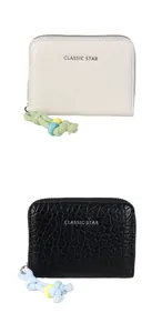 Close-up of textured leather wallets with colorful bead pulls and Classic Star text