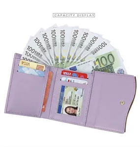 Internal view of light purple trifold wallet showing multiple card slots and ID window