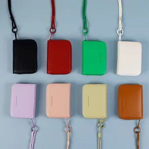 Mini macaron leather coin purse with neck lanyard in eight assorted pastel colors