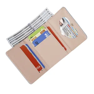 Pink PU leather tri-fold wallet for women with bear embroidery and clear heart window