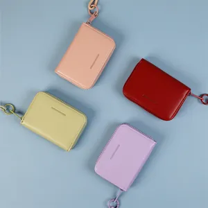 Colorful Macaron zipper mini wallets with Forever Sunshine text and metal hooks