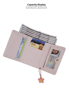 Internal view of light pink tri-fold floral wallet showing card slots and cash pocket